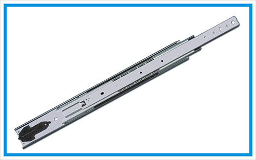 Heavy duty drawer slide with spring self-closing device